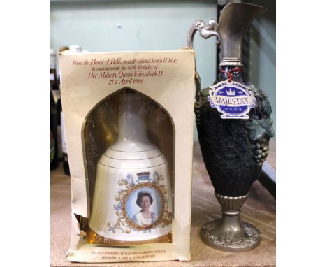 Bells Scotch Whisky in presentation box, 1 bottle Majestat VSOP, 1 bottle