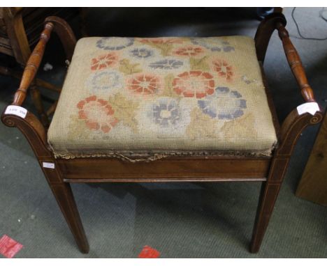 An Edwardian inlaid mahogany piano stool with lift up tapestry upholstered lid
