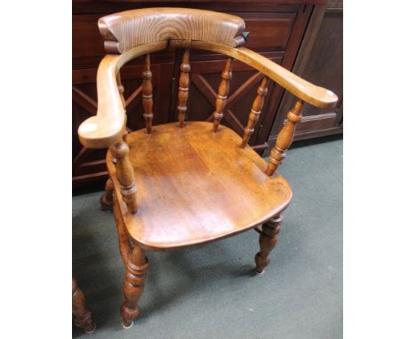 Early 20th century Windsor comb back smokers bow elbow chair