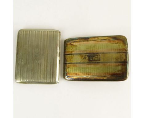 Lot of Two (2) Vintage Silver Cigarette Cases. One Sterling and 14 K, Signed. Good condition. Measures 4-1/2" x 3-1/8" and we