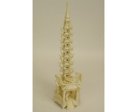 Chinese Carved Ivory Pagoda Tower. Unsigned. Minor losses, splits otherwise good condition. Measures 10-3/4" H, 3-1/4" W. Thi