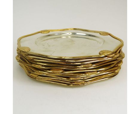 Set of Twelve (12) Alpaca Metal Shell Motif Plates. Each marked Alpaca. Light surface scratches. Measures 12-1/4" dia. Shippi