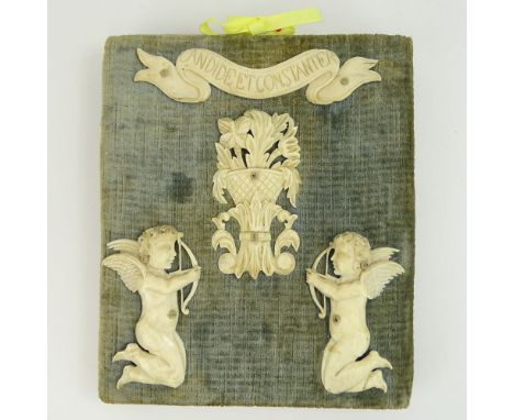 Early Carved Ivory Motto Plaque on Fabric Covered Board. Candide et constanter - Openly and steadfastly. Unsigned. Age cracks