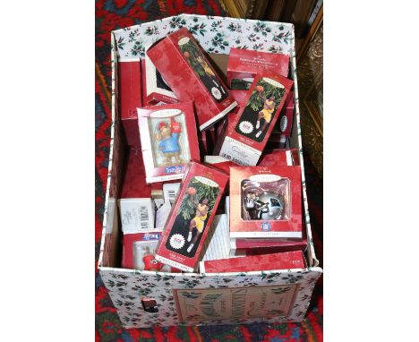 A box quantity of hallmark keepsakes including globe trotters, NFL etc.