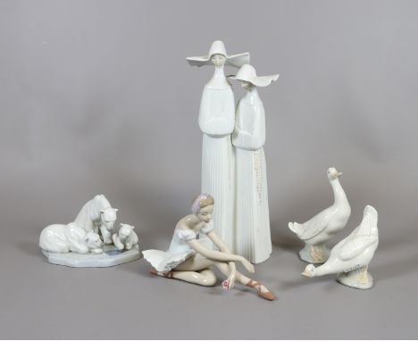 A Lladro figure group of two nuns, another modelled as a family of polar bears, a figure of a ballerina and two Nao geese.