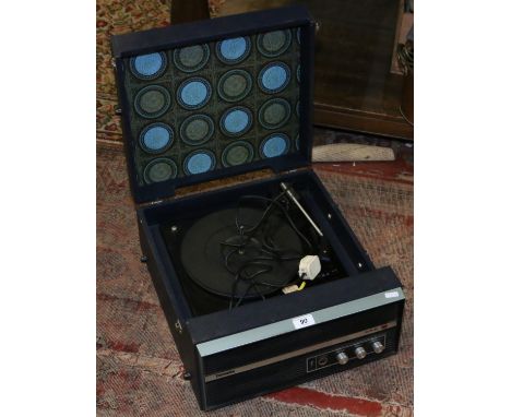 A Dansette Capri SL record player model number DRP23 covered in blue vinyl (AF).