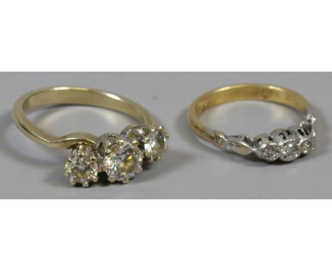 An 18ct gold stone set ring size M and a 9ct gold stone set ring size Q 6.7 gross.