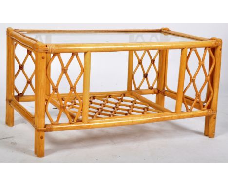 A retro vintage Italian 20th Century bamboo coffee table in the manner of Franco Albini. The coffee table having an inset gla