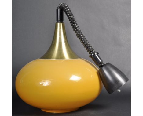 An original retro vintage 1970's glass rise and fall pull down ceiling light lamp in the manner of Harvey Guzzini. The light 