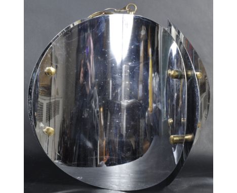 A retro 20th Century American 1970's hanging ceiling light shade constructed form four concave chrome panels connecting via b