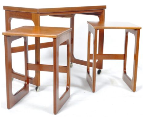 McIntosh of Kirkcaldy - A vintage mid 20th Century McIntosh teak wood nest of tables with folding occasional top and two smal