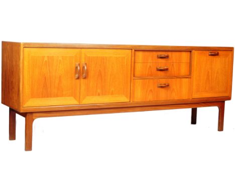 G Plan Sierra Range - An original retro vintage 1960's teak wood sideboard credenza comprising a pair of doors opening to rev