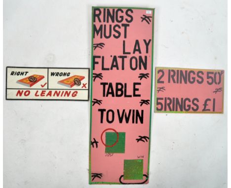 A selection of three vintage 20th Century 1980's fairground / funfair painted signs mostly relating to ring toss with two sig