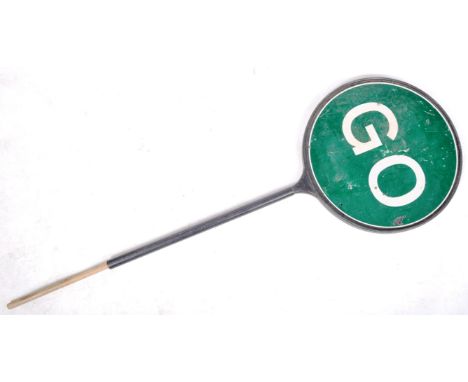 A 20th century retro vintage industrial metal ' STOP ' and ' GO ' traffic motoring car lollipop enamel sign having a metal do