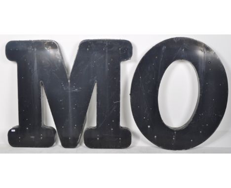 A set of four retro vintage mid 20th Century large size metal industrial external advertising point of sale letters consistin
