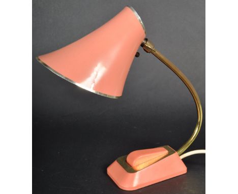 A retro vintage mid 20th Century table / desk / bedside lamp light finished in&nbsp; a pink colourway with conical shade supp