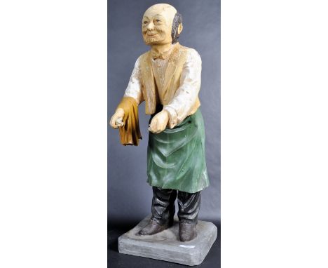 A retro vintage mid 20th Century chalk / plaster dumbwaiter figurine. The advertising / restaurant figure of typical form in 