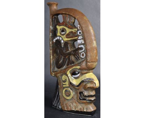 Luxardo - A retro vintage 20th Century advertising pottery decanter of Aztec influence in the form a face with a creature mou