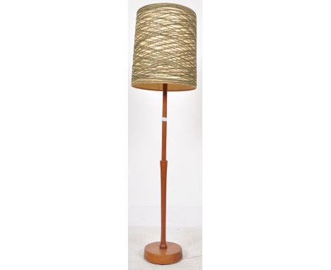 A retro mid 20th Century&nbsp;1960's Danish teak wood floor standing standard lamp light having a stepped single tapering ste