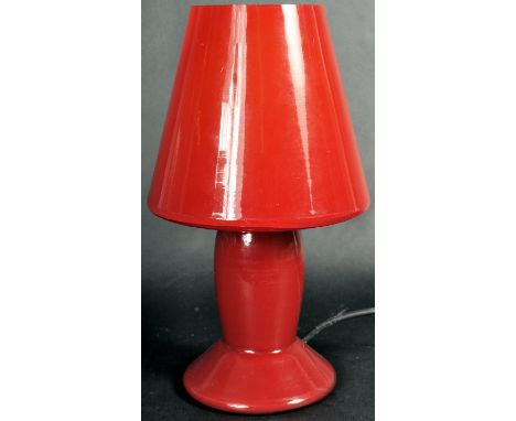 A retro vintage 20th Century studio art glass lamp comprising of a single piece scarlet red conical rocket shade with central