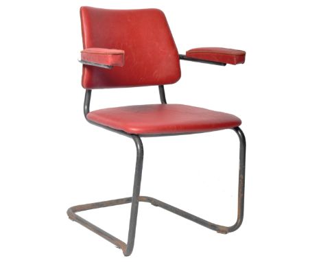 An original retro vintage 1970's Remploy made tubular metal office desk chair / armchair having red leather upholstered back,