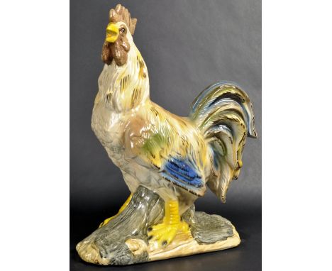 A large early 20th Century ceramic hand painted shop / butchers display advertising poultry cockerel having painted features 