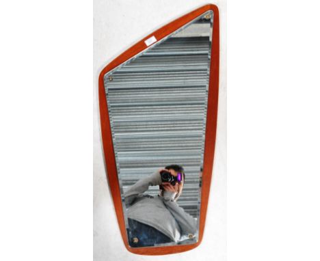 A retro vintage Danish 1960's teak framed hanging mirror of harp shape housing single mirrored panel. Hanging wire to verso a