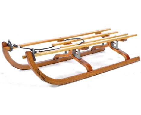 A vintage 20th Century Bentwood and oak sled /&nbsp;bobsleigh / sleigh having oak slates to the top with benwood supports hav