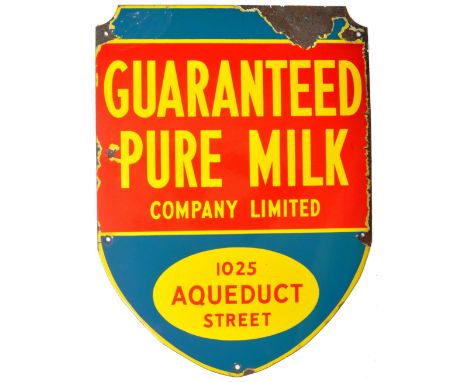 A scare mid 20th Century Canadian Guaranteed Pure Milk Company Limited advertising point of sale dairy enamel sign. The sign 
