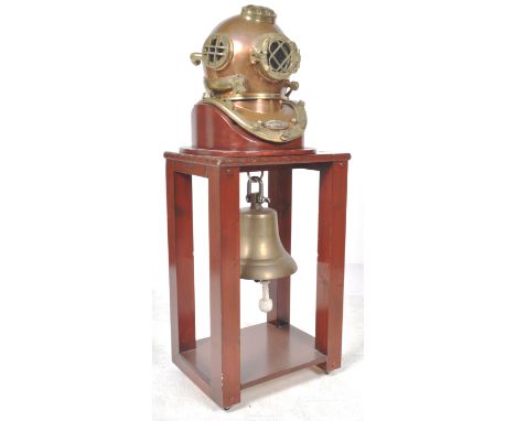 A large 20th Century nautical themed light / lamp comprising of an upright stand and the shade being an original brass divers