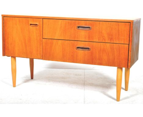 A retro vintage mid 20th Century Danish influence sideboard credenza / chest of small proportions having two long drawers fla