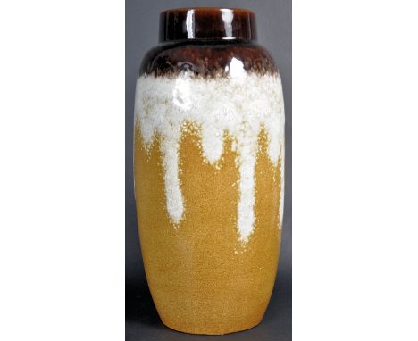 A retro vintage 1960's West German studio art pottery Fat Lava type vase. The vase having a brown and treacle ground with whi
