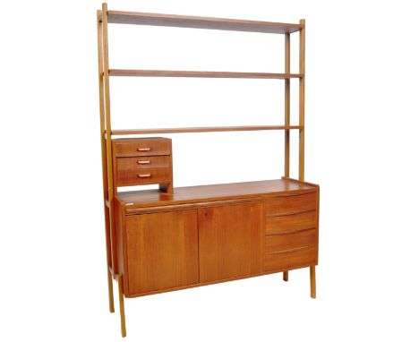 A retro vintage 1960's Danish teak wood wall unit / room divider. Comprises a series of shelves with bank of three small draw