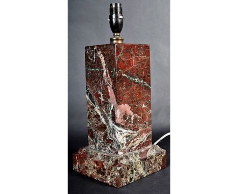 A vintage 20th Century Art Deco red marble table lamp light having a bakelite fitting atop a rectangular marble column raised