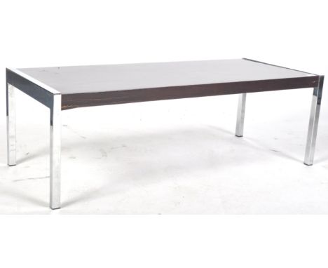 Manner Of Merrow Associates - A retro vintage 1970's teak and chrome coffee table comprising of a rectangular table top house