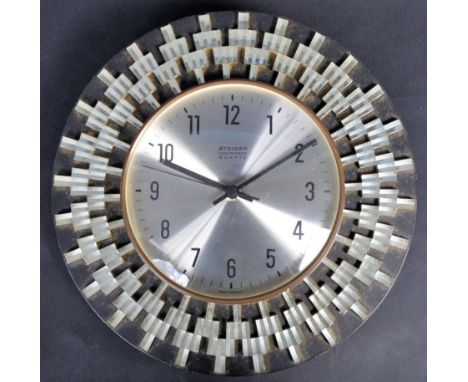 Staiger - Chrometron - An original retro vintage mid 20th Century wall clock having a central silvered circular dial with fac