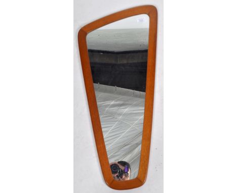 A retro vintage 1960's teak wood frameless wall mirror. The mirror of oblong lozenge shape with central mirror panel housed w