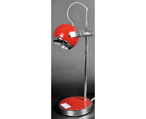 A late 20th Century retro sputnik atomic Eyeball desk lamp light in the manner of Gino Sarfatti for Arteluce. The lamp in a r