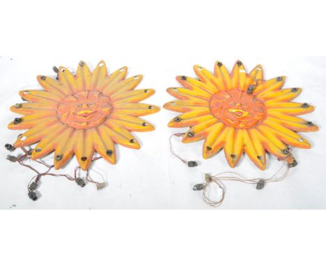 A matching pair of vintage 20th Century 1960's / 70's fairground / funfair fiberglass sun lights. Each of typical form with c