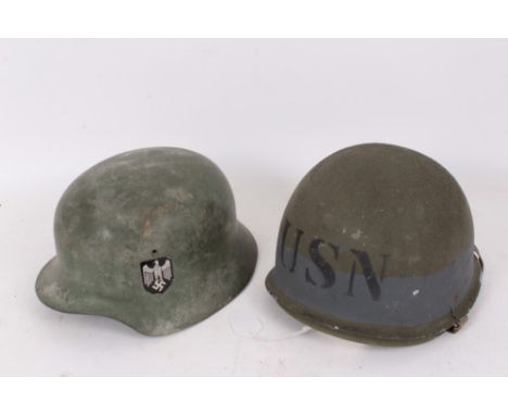 Film interest - Replica (plastic) Second World War American M1 helmet, with US Navy marking, believed to be ex. Saving Privat