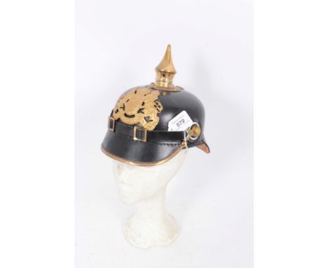 Reproduction Imperial German Picklehaube helmet of leather construction with gilt eagle badge