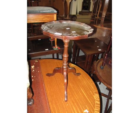 Small reproduction pie crust top tripod wine table.