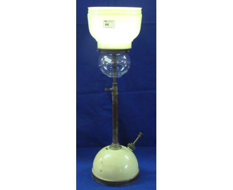 Tilly type pressure lamp with opaque glass shade.