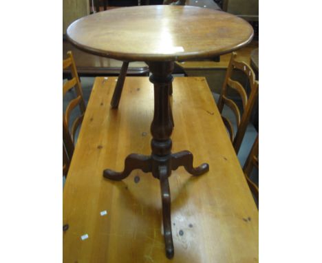 Small mahogany snap top tripod table.