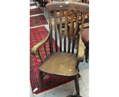 Beech and elm slat back kitchen armchair.