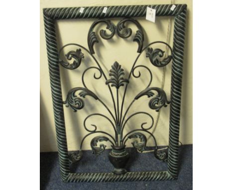 Oxidised metal foliate pierced panel in gadroon frame.