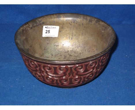 Chinese carved wooden bowl overall with incised scroll work and having metal liner. CONDITION REPORT: No obvious damage or lo
