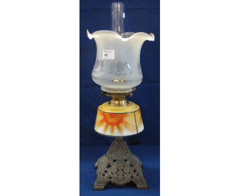 Early 20th Century brass double burner oil lamp with ceramic reservoir, cast metal base and etched glass shade with clear chi