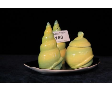 Carlton Ware china four piece cruet set, pieces in shell shapes on a scallop shell base.