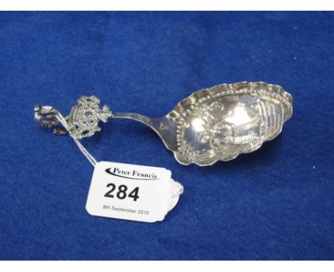 Dutch silver repousse decorated fancy caddy type spoon.